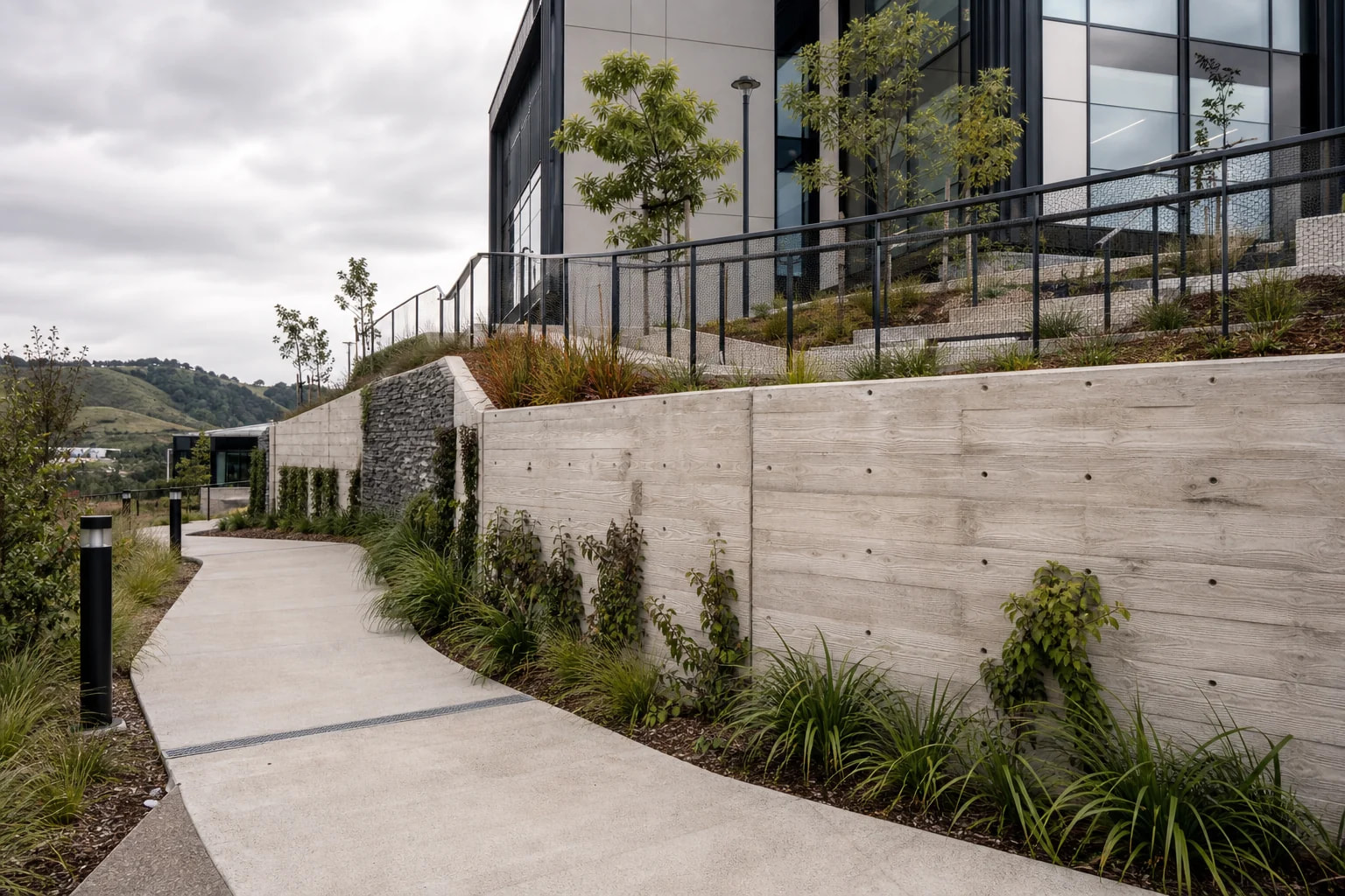 Large engineered concrete retaining wall for a commercial site